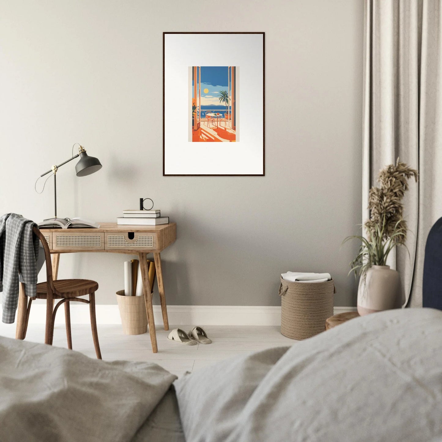 Wooden desk with a lamp and framed posters from Tranquil Mirage Brunch collection