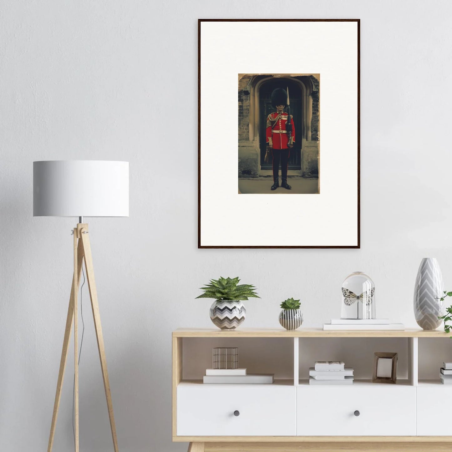 Framed photo of a Queen’s Guard in red uniform for Solstice Brickbeard Visitor