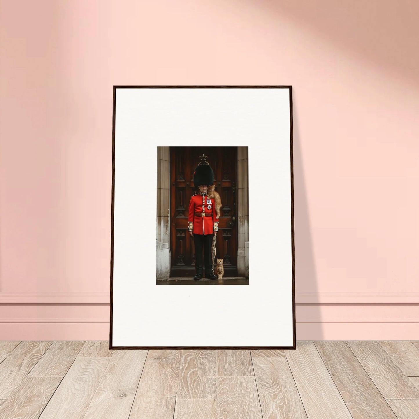 Framed wall art of a Queen’s Guard in red uniform for God Save the Queen and the Cats