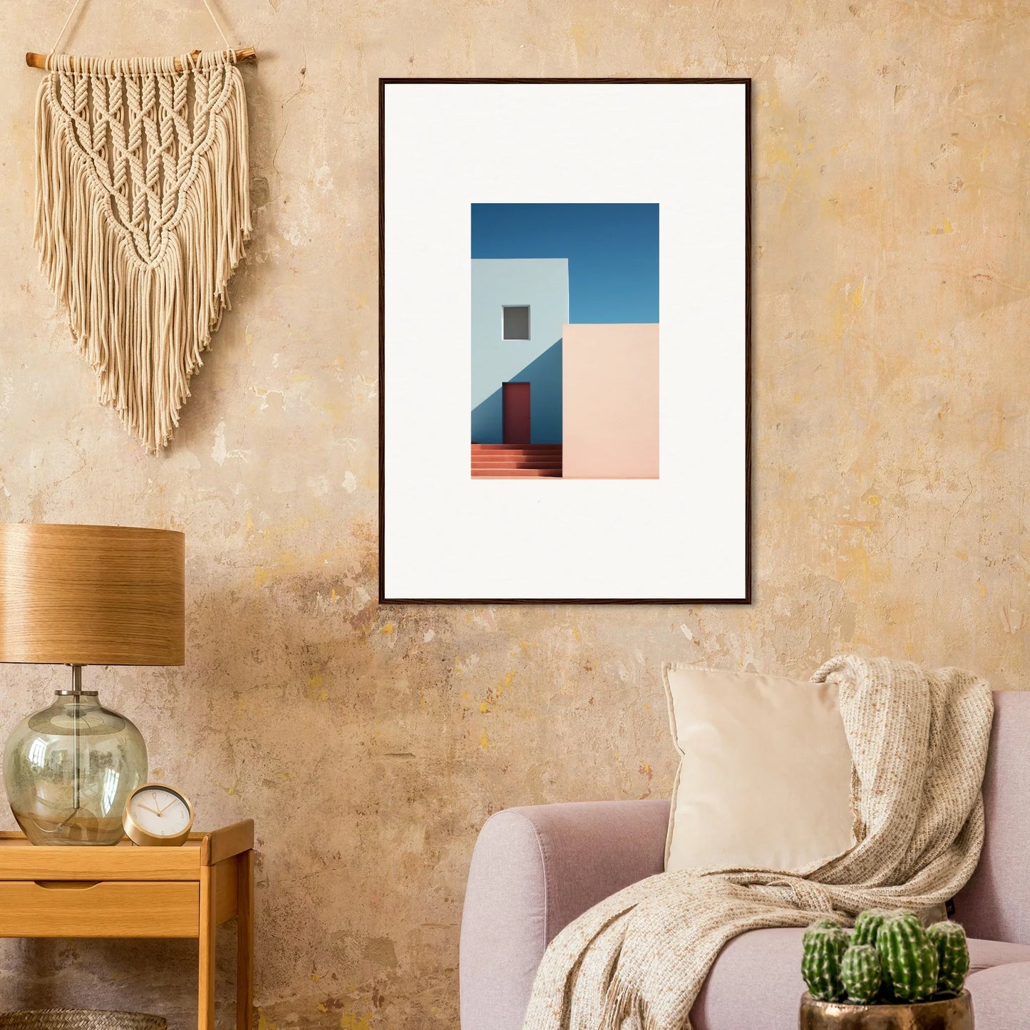 Framed minimalist art print of a white structure against blue sky and pink wall