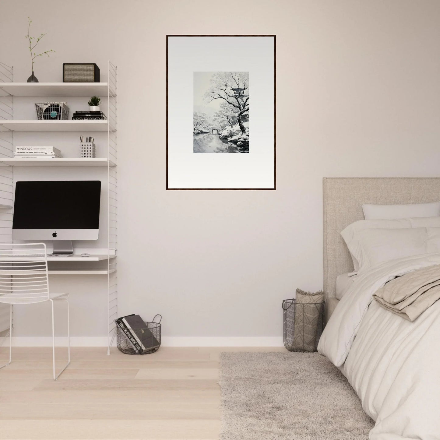 Minimalist bedroom workspace with iMac and Chilled Lunar Embrace framed posters
