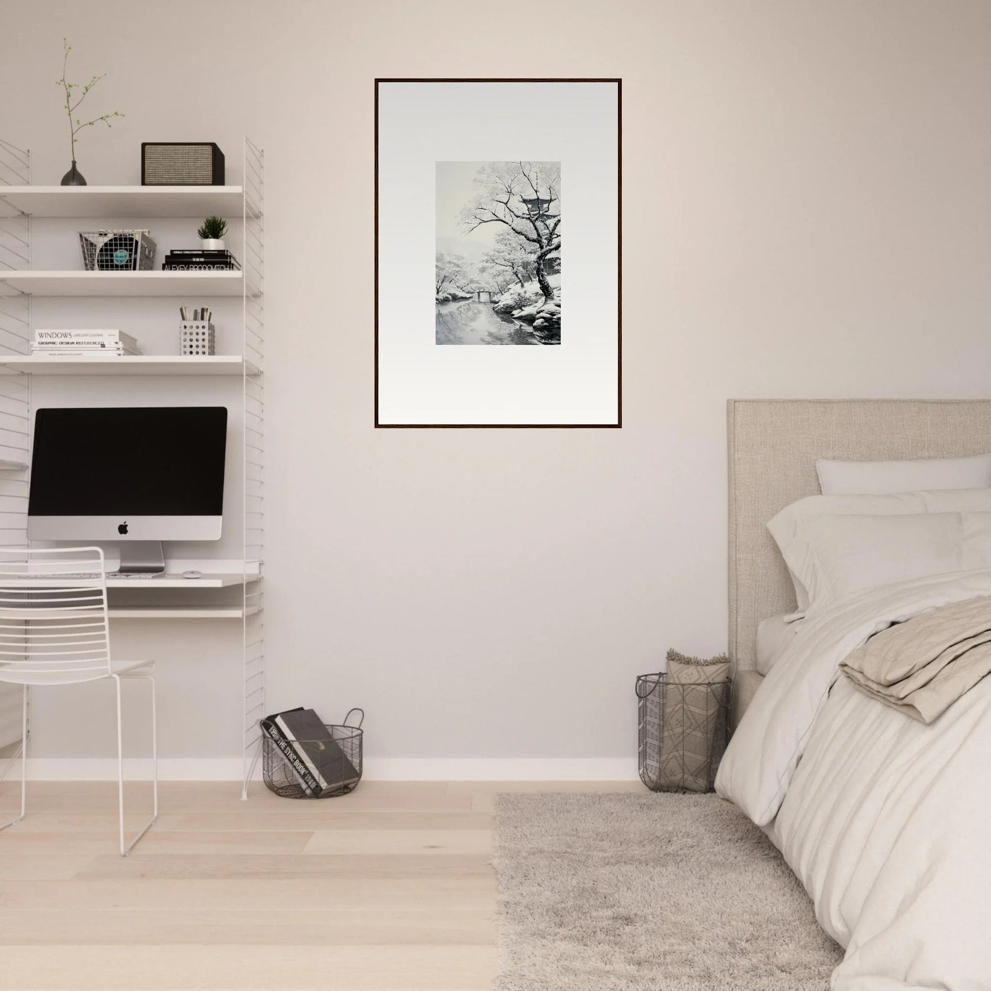 Minimalist bedroom workspace with iMac and Chilled Lunar Embrace framed posters