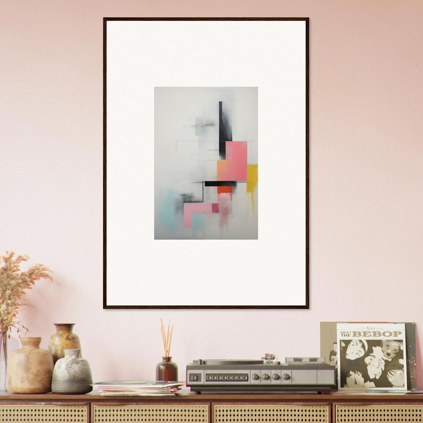 Framed wall art of geometric shapes in pink, yellow, and gray from Ethereal Chrome Juxtaposition