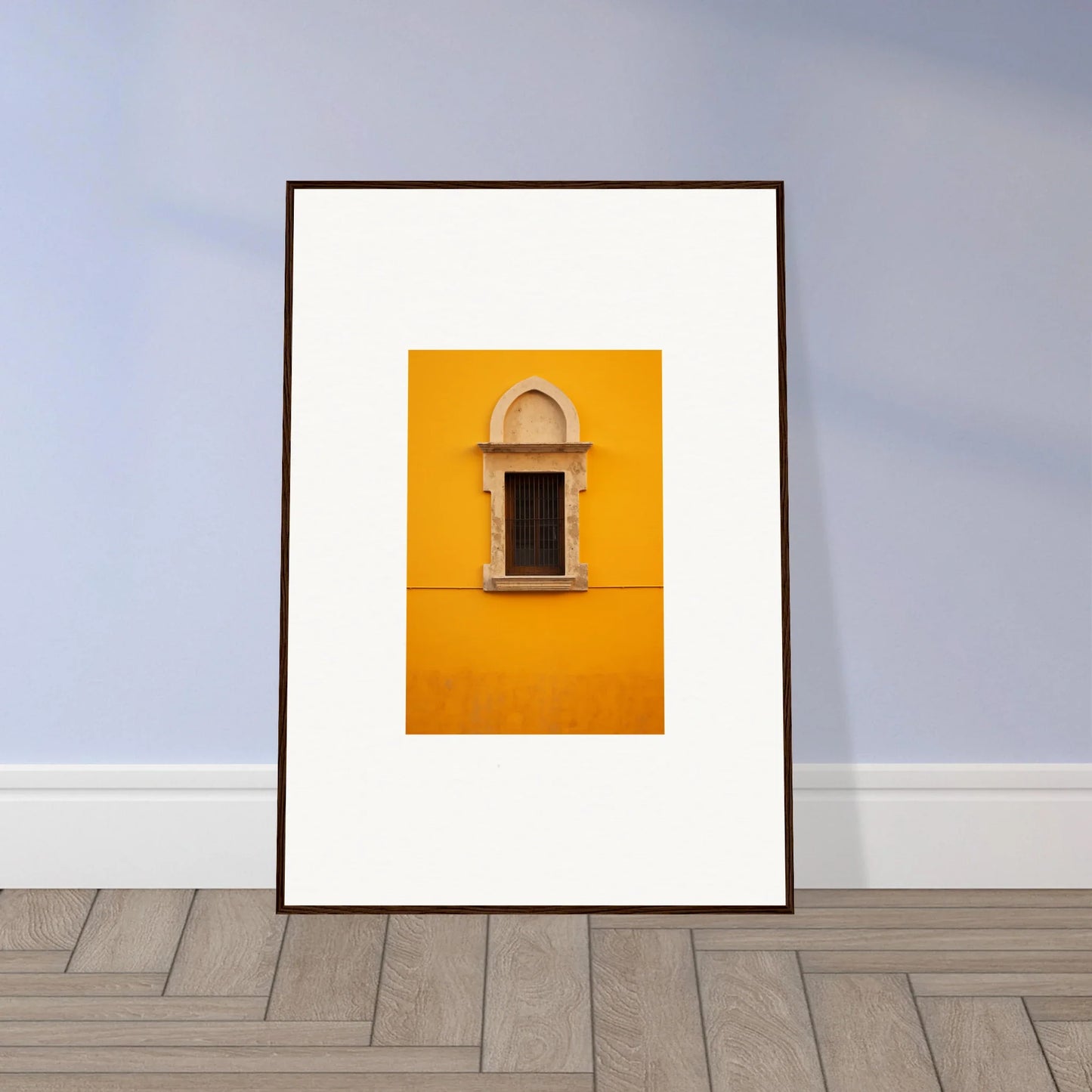 Framed wall art of an ornate window on a yellow wall for the Golden Correspondence Portal