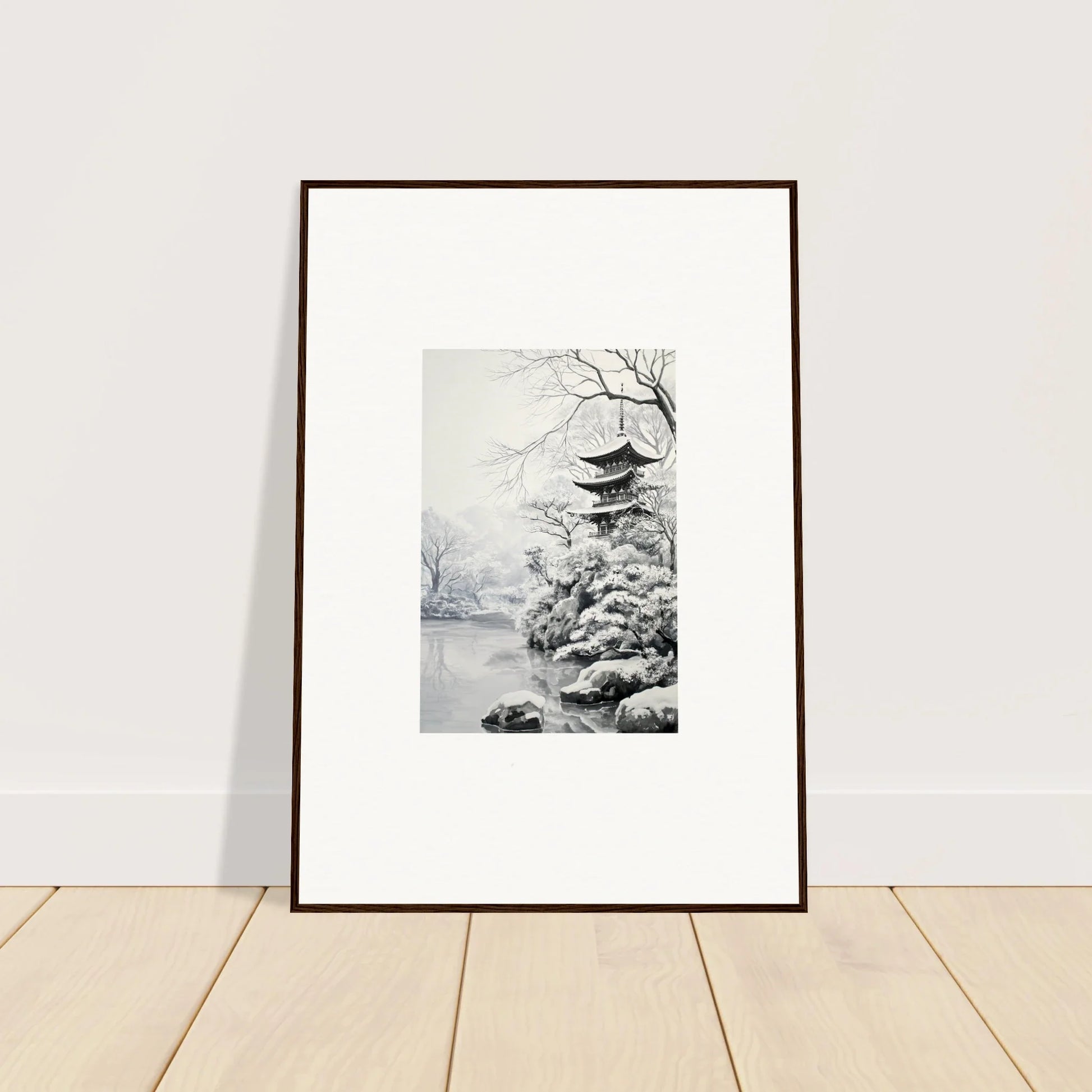 Framed black and white artwork of a Japanese pagoda in a winter scene for Crystallized Blossom Oasis