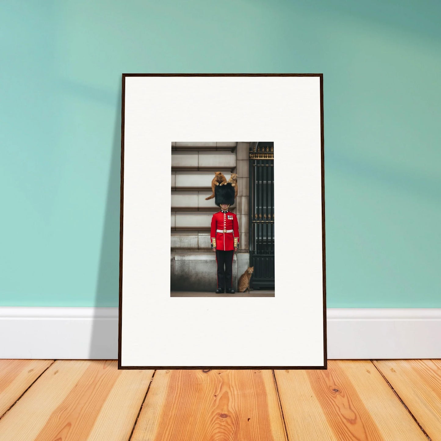 Framed poster of a Queen’s Guard in red uniform at Sensational Sentinels’ Playground