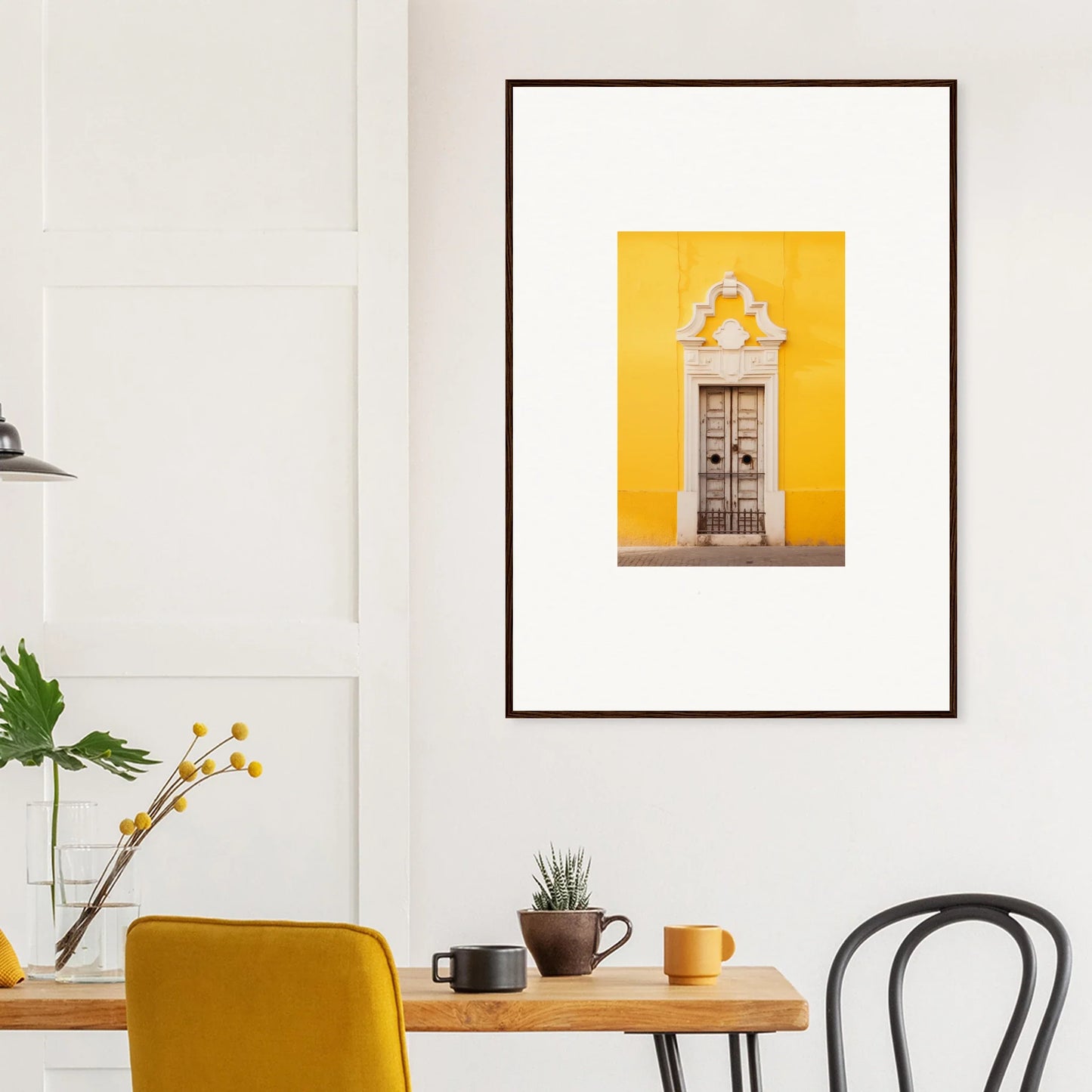 Framed wall art of Dandelion Desires Gateway on a yellow wall with ornate door