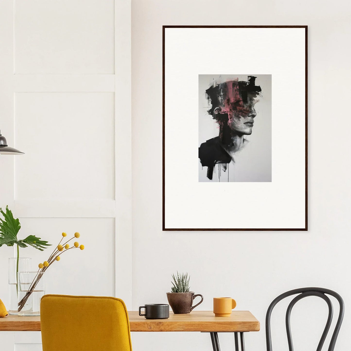 Framed black and white Fragmented Psyche Canvas artwork with red accents on a white wall