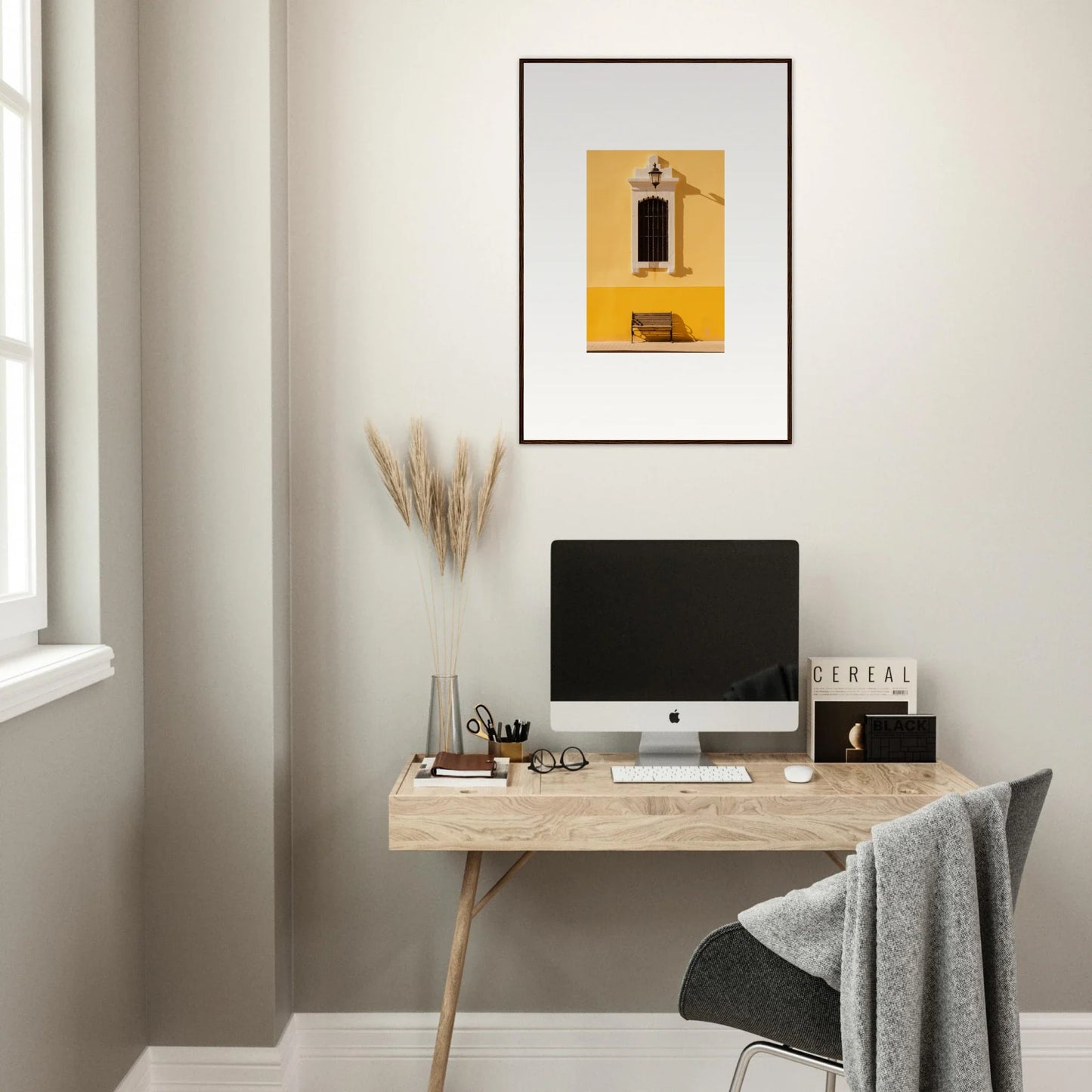 Minimalist wooden desk with iMac and premium framed wall art from Six-light Cult Optionsky