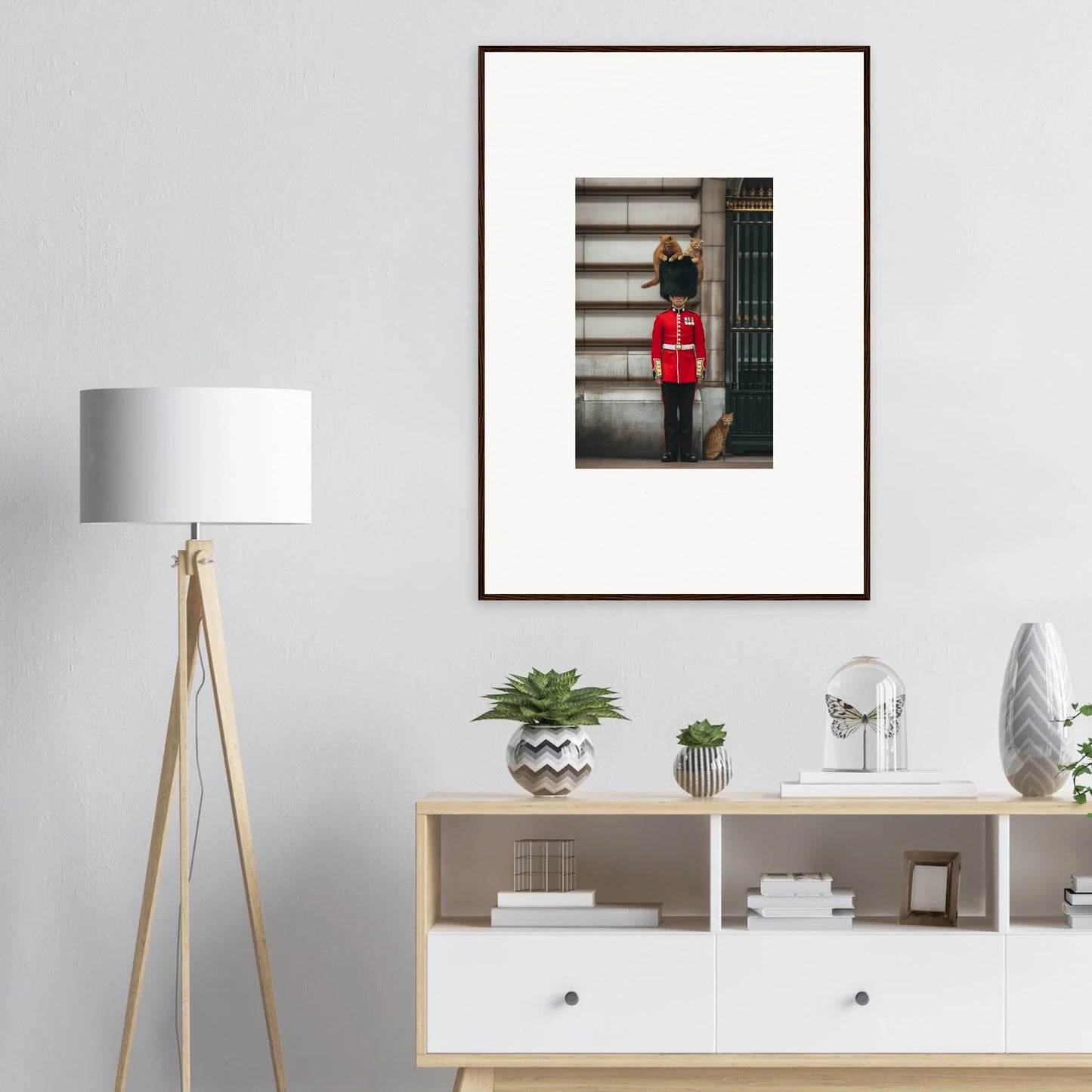 Framed poster of a Queen’s Guard in red uniform at Sensational Sentinels’ Playground