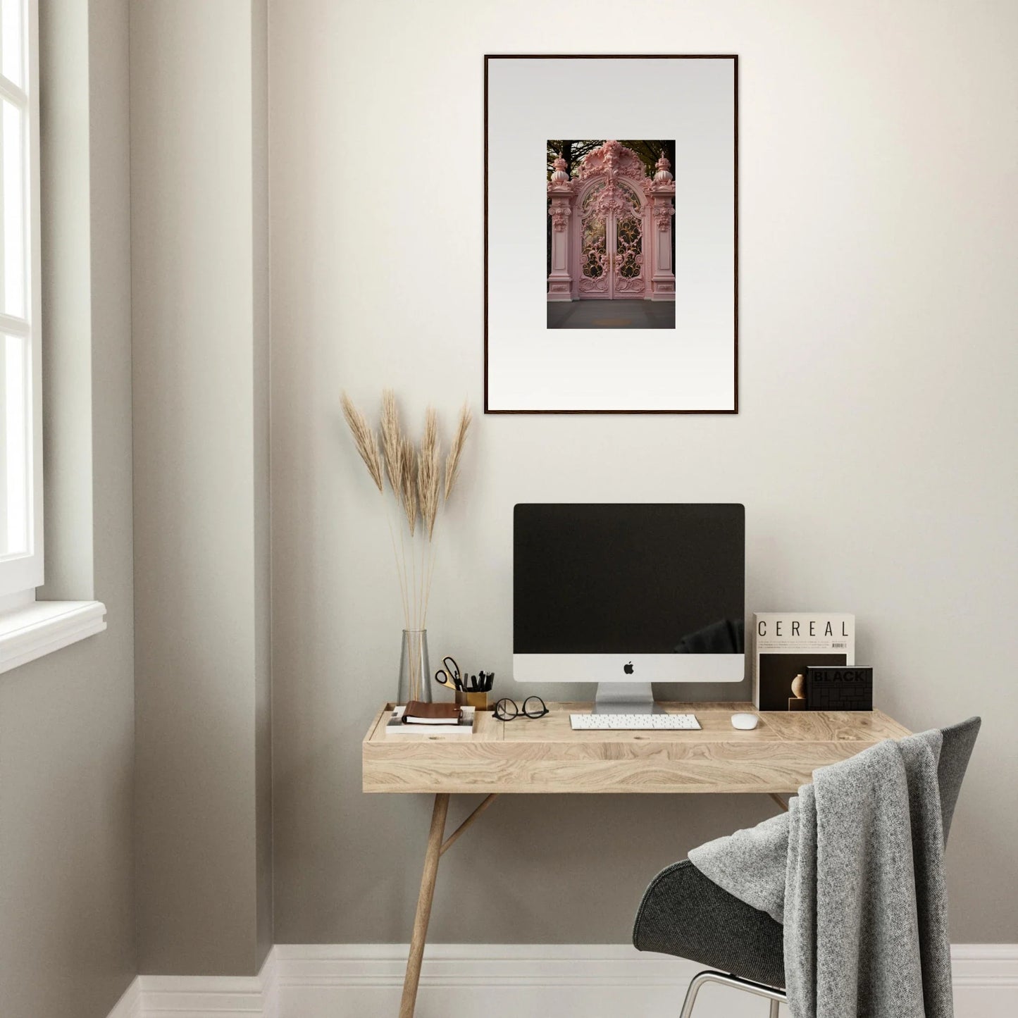 Minimalist wooden desk with iMac and framed artwork from Opulent Doorscape Divinity
