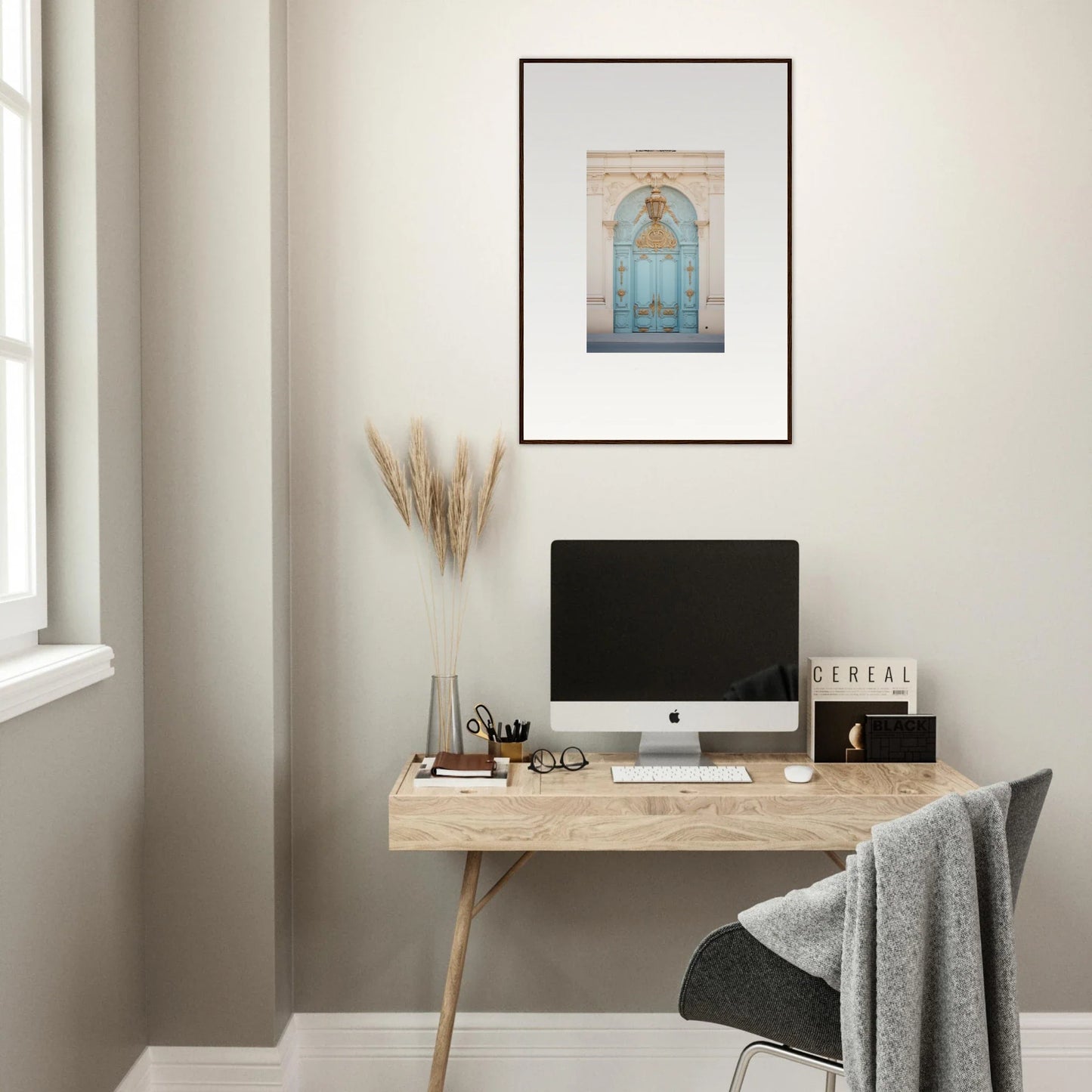 Minimalist wooden desk with iMac and Ethereal Thresholding Gate artwork above