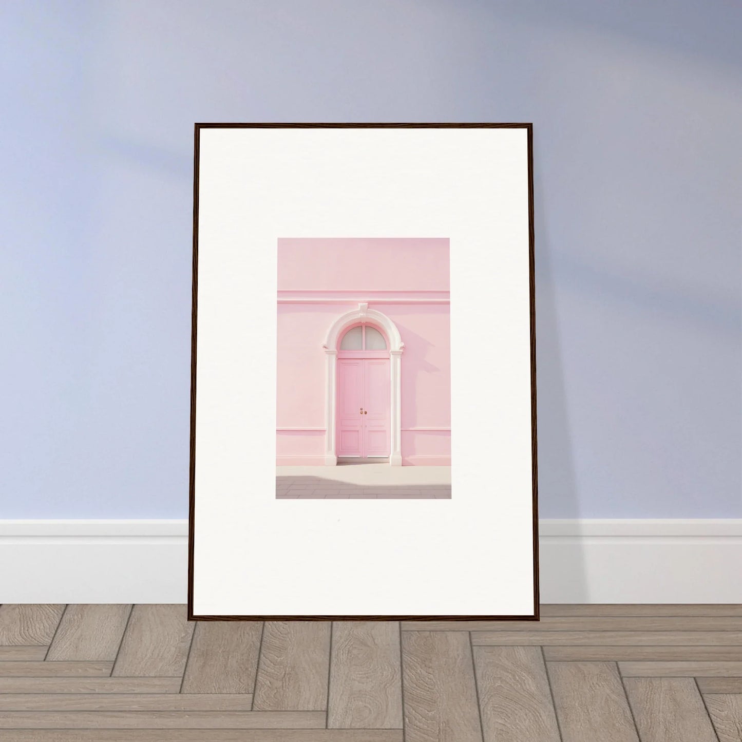Framed wall art of a pink arched door on a pale wall in Pearly Baccarat Dream design