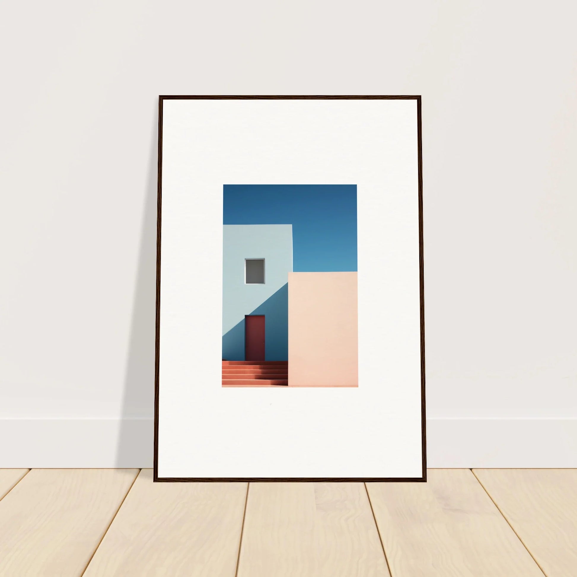 Minimalist framed wall art with white walls, red door, and blue sky from Tangents of Porcelain