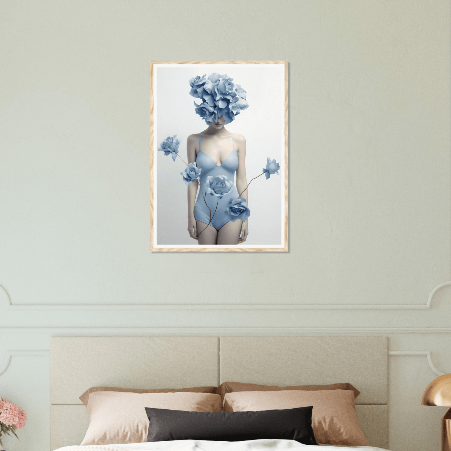 Surrealist artwork depicting a female figure with blue floral elements replacing her head and adorning her body.