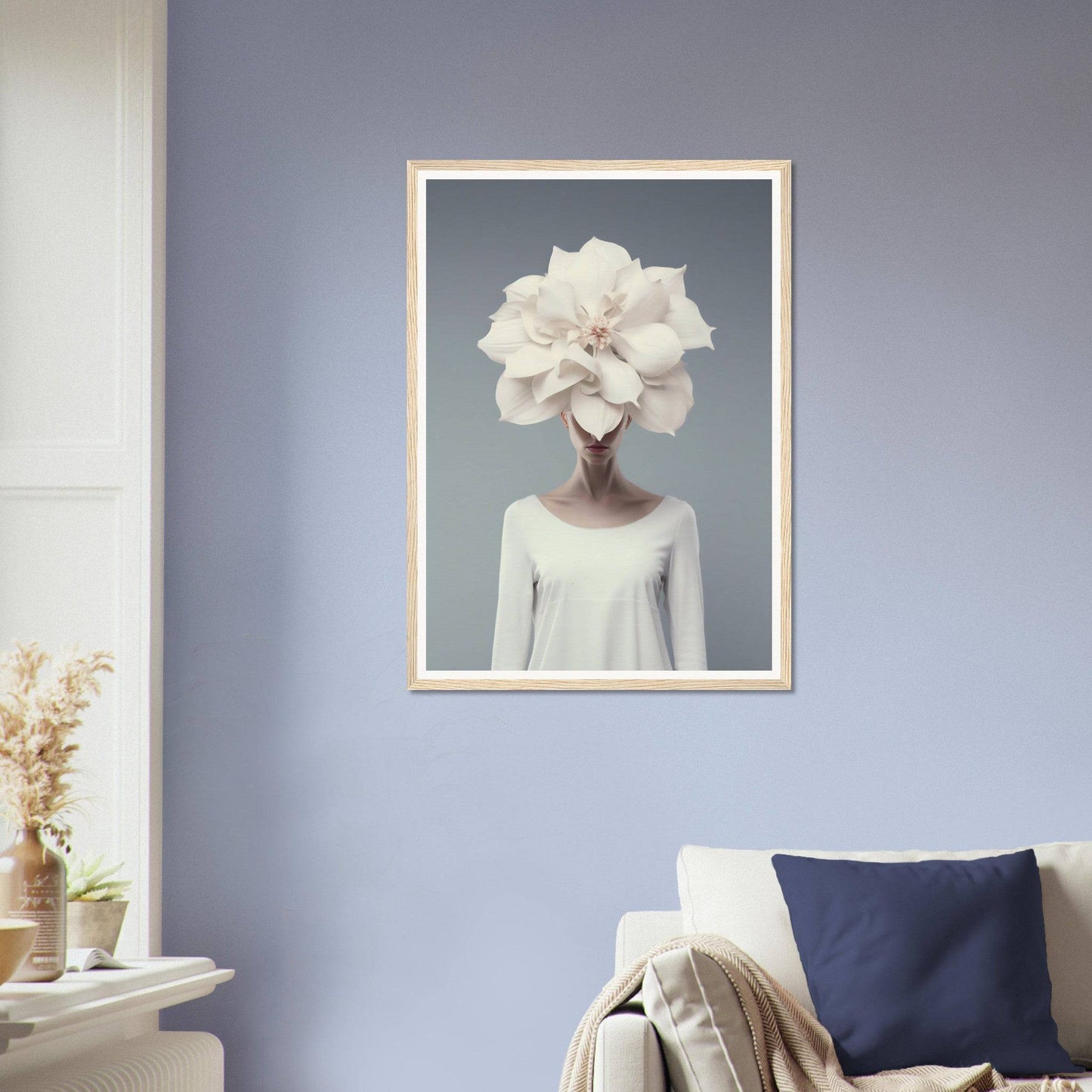 Framed surrealist artwork depicting a figure with a white flower in place of a head.