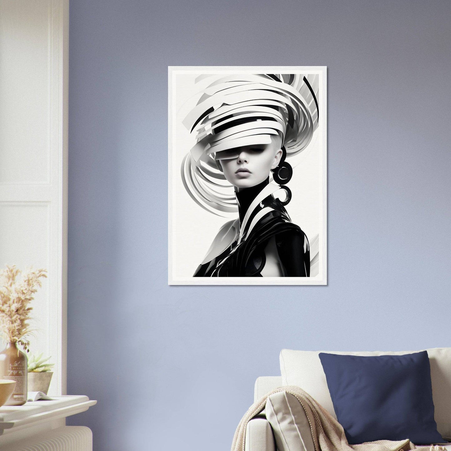 Black and white portrait of a person wearing an elaborate, swirling hat that covers their eyes.