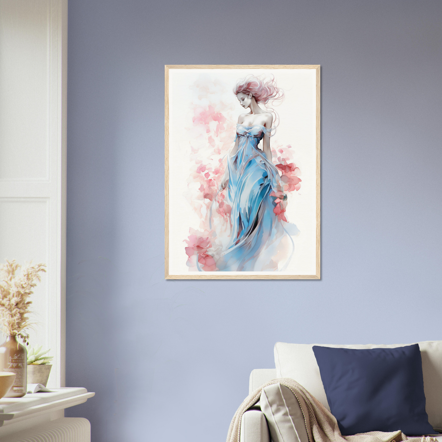 Framed watercolor painting of a woman in a flowing blue dress with pink floral accents.