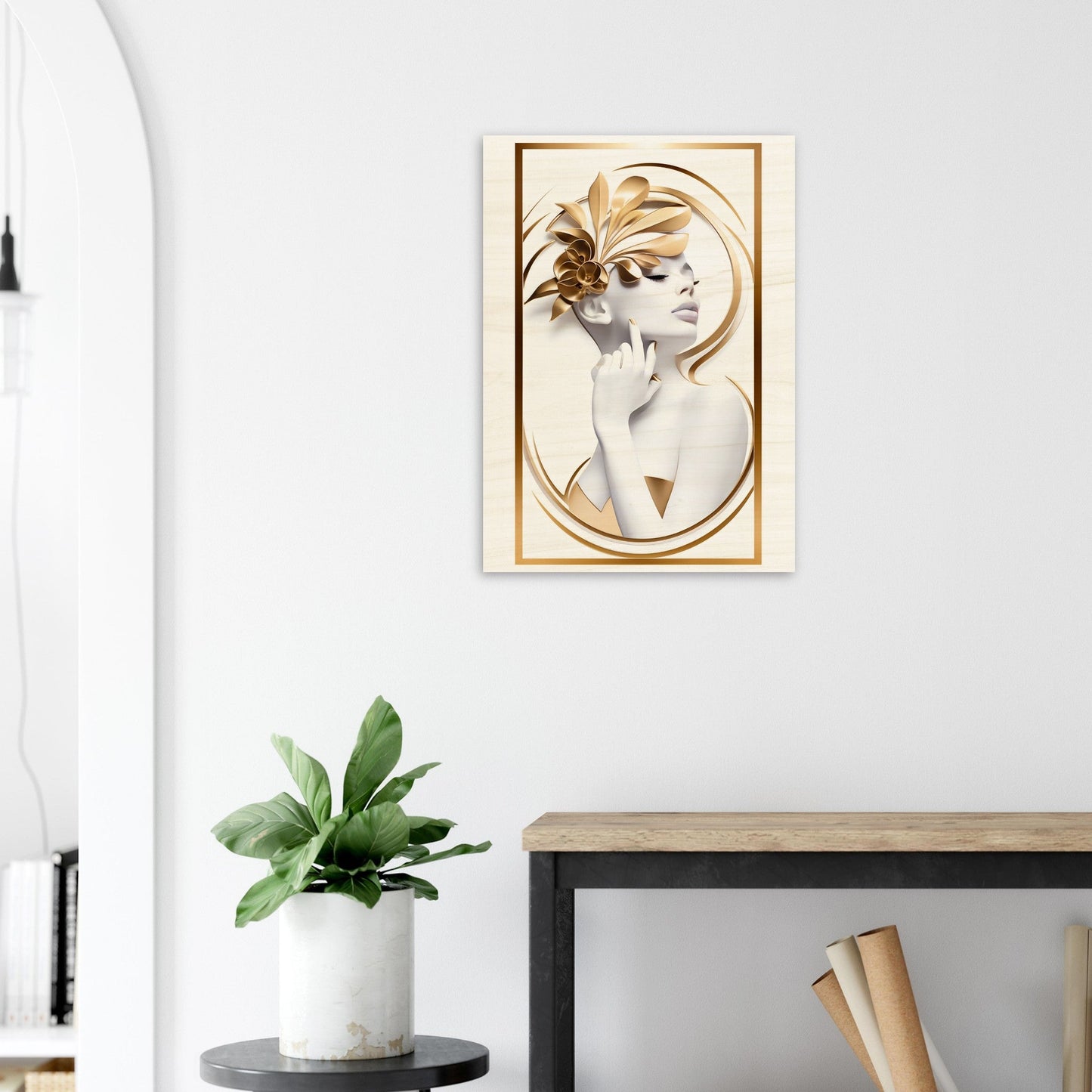 Framed artwork depicting a stylized profile portrait with golden accents.