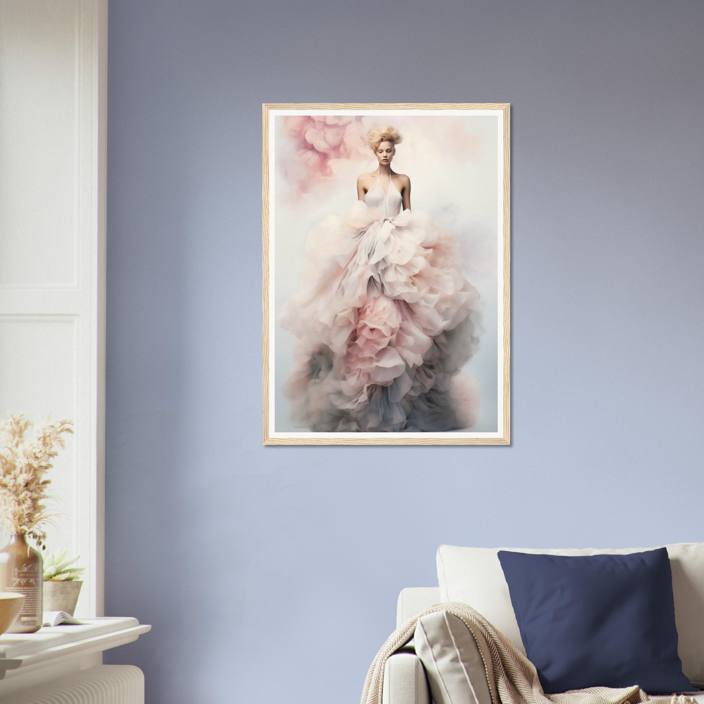 Framed artwork depicting an ethereal figure in a flowing white dress with pink accents.