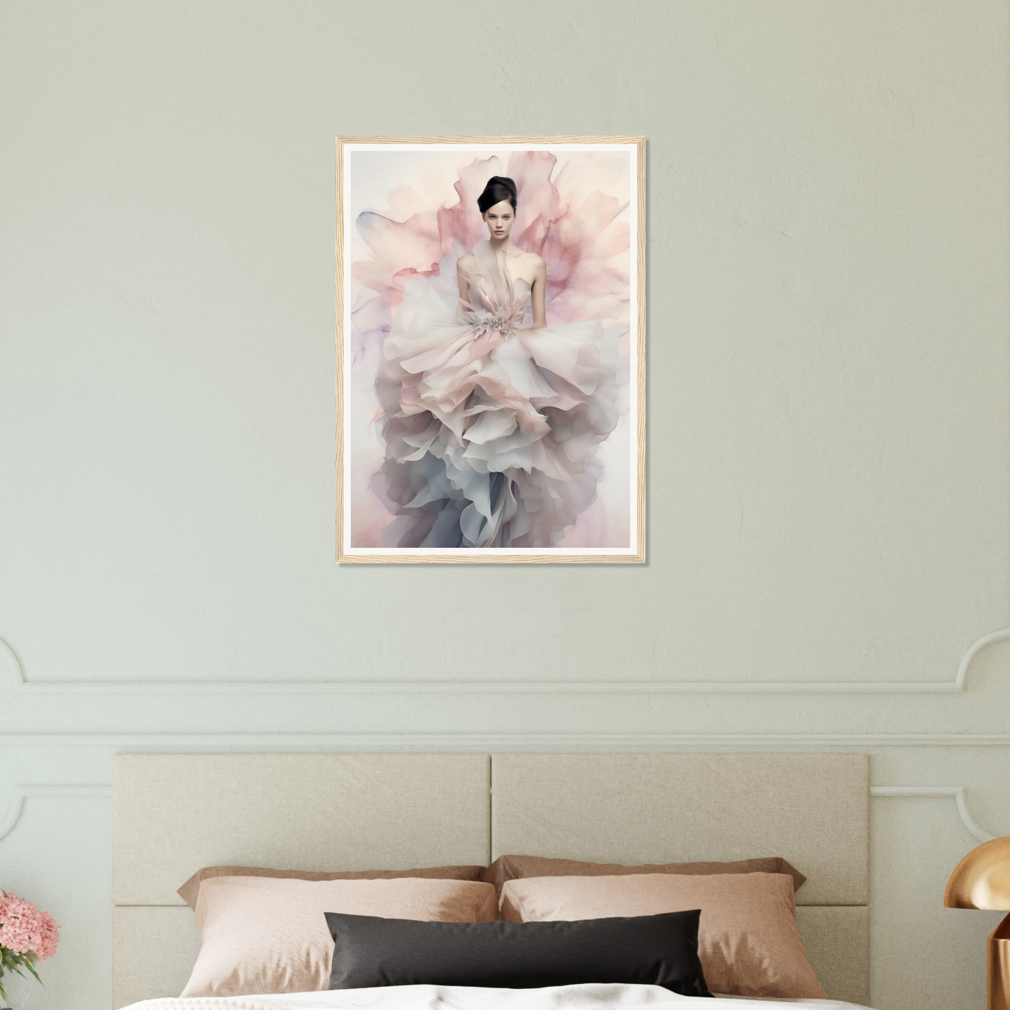 Framed artwork depicting a figure in a flowing, ethereal dress with soft pastel colors.
