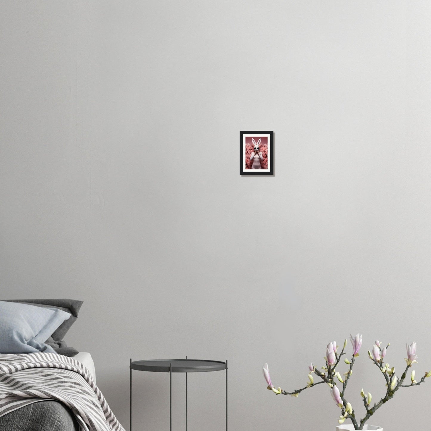Framed playing card featuring a red jack or king on a light gray wall.