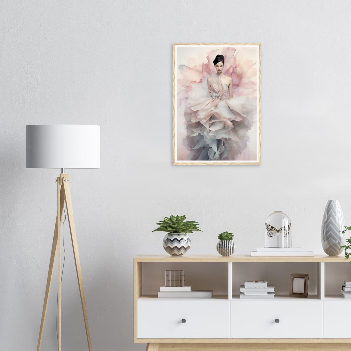 Framed artwork depicting a graceful figure in flowing, ethereal attire.