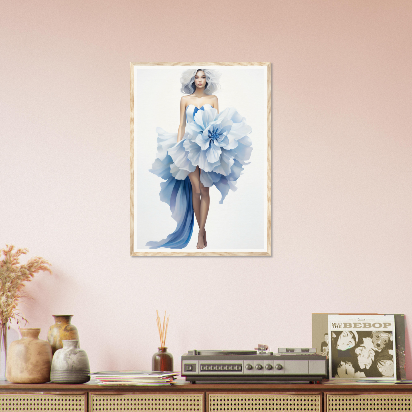 A woman in a blue dress with flowers on her head and a pink wall behind her