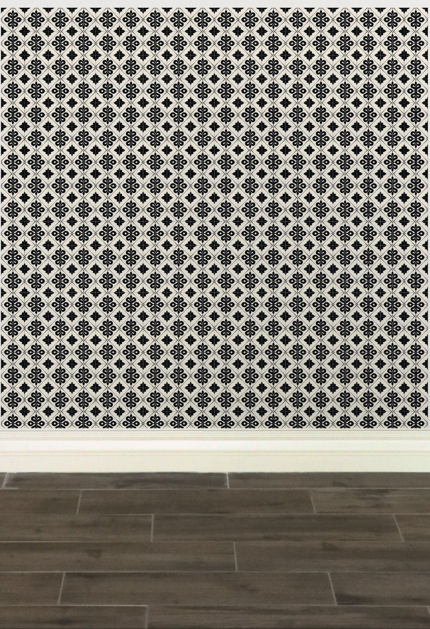 Geometric patterned wallpaper with black and white floral or star-like designs.