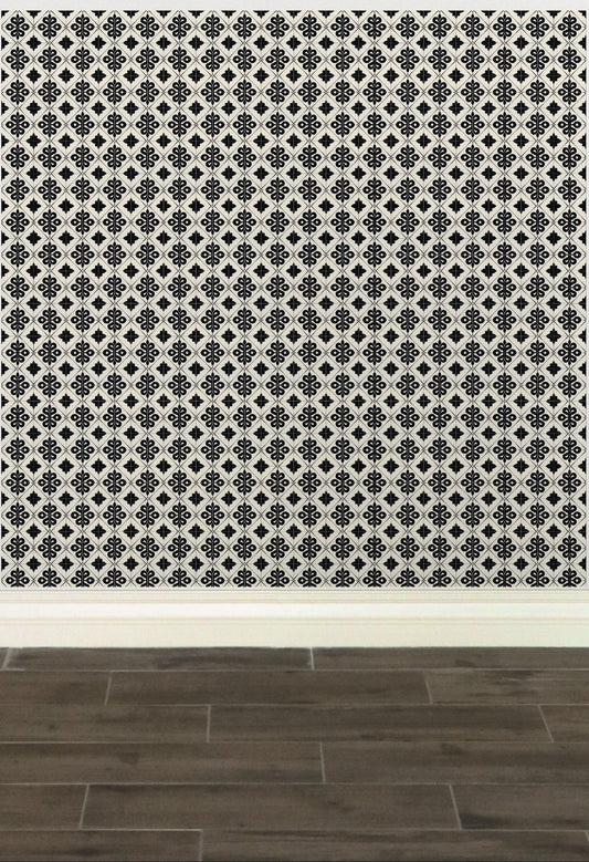 Geometric patterned wallpaper with black and white floral or star-like designs.