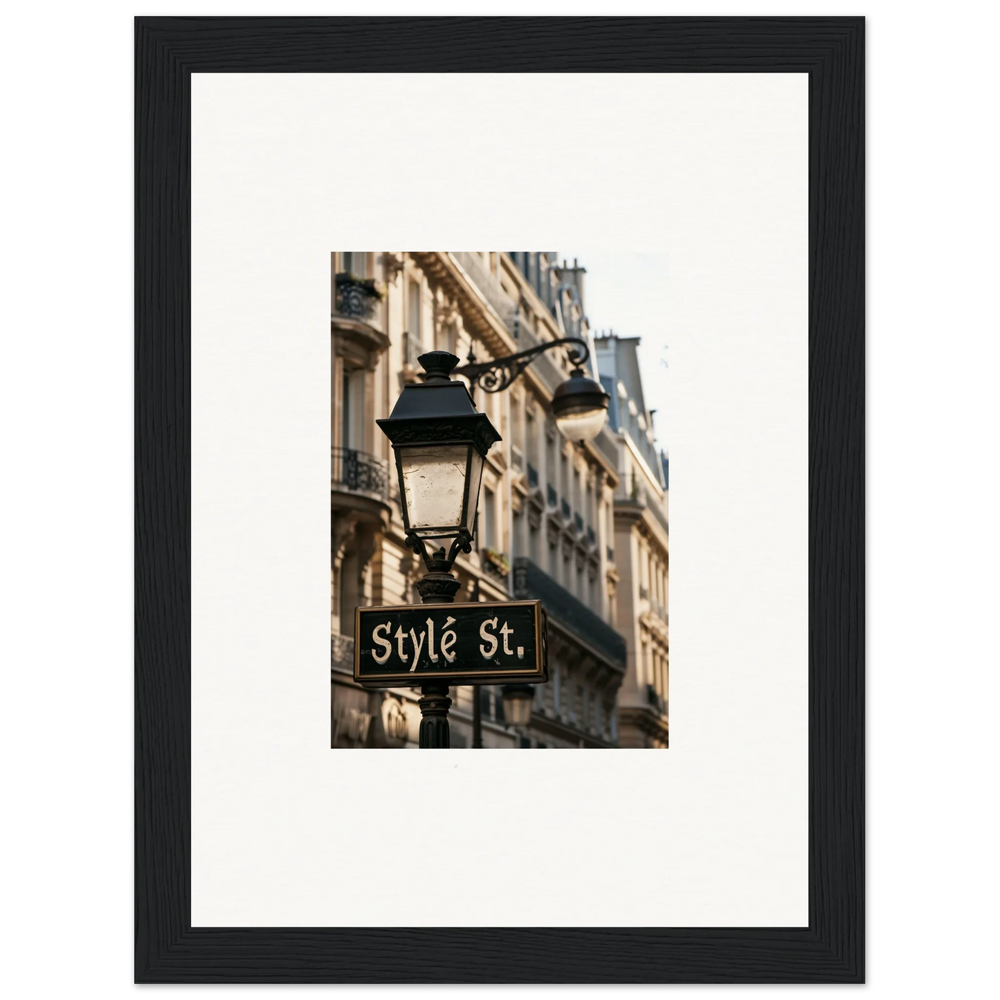 Framed wall art of a Parisian street lamp, perfect for room decoration or canvas print