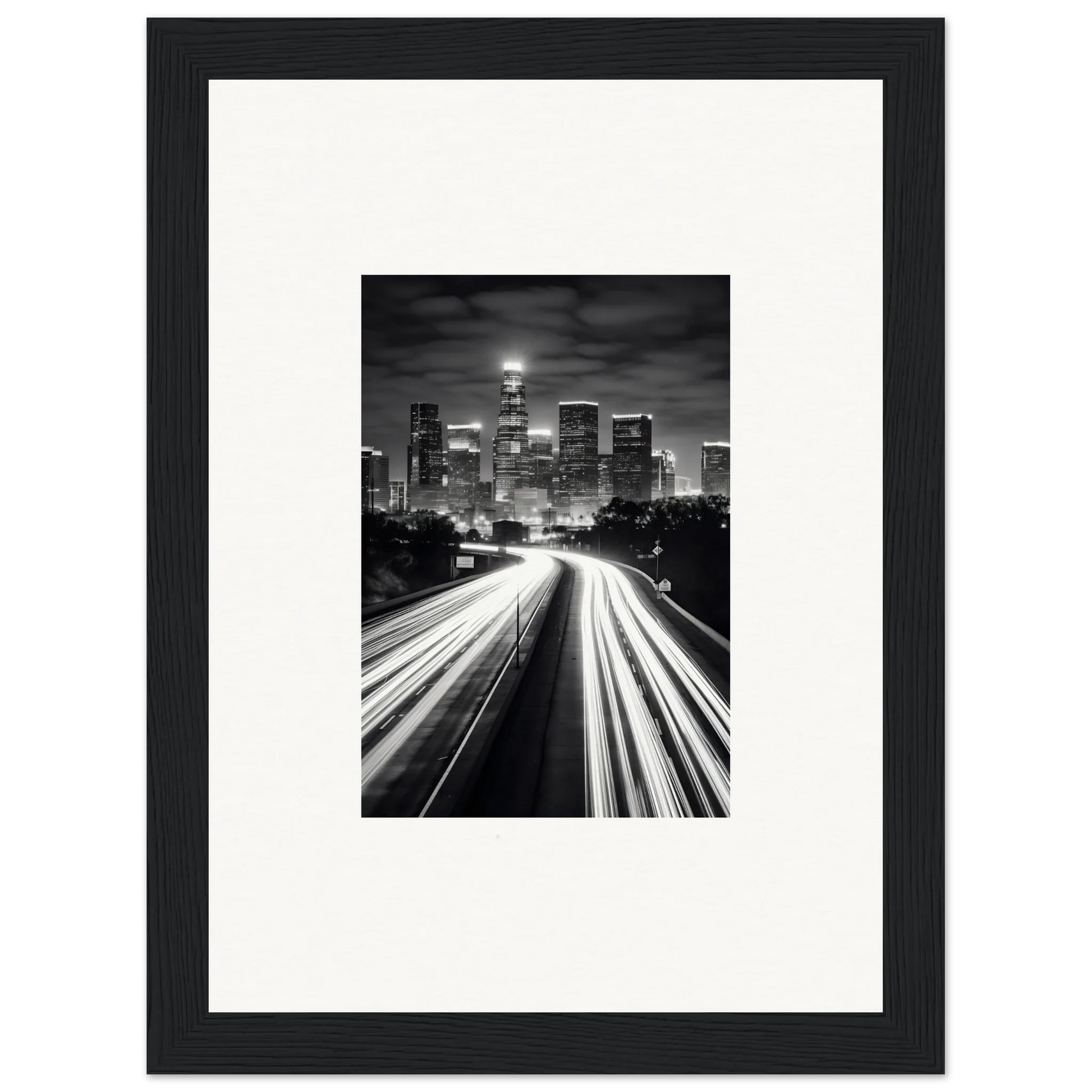 Black and white city skyline with traffic light trails in framed wall art design