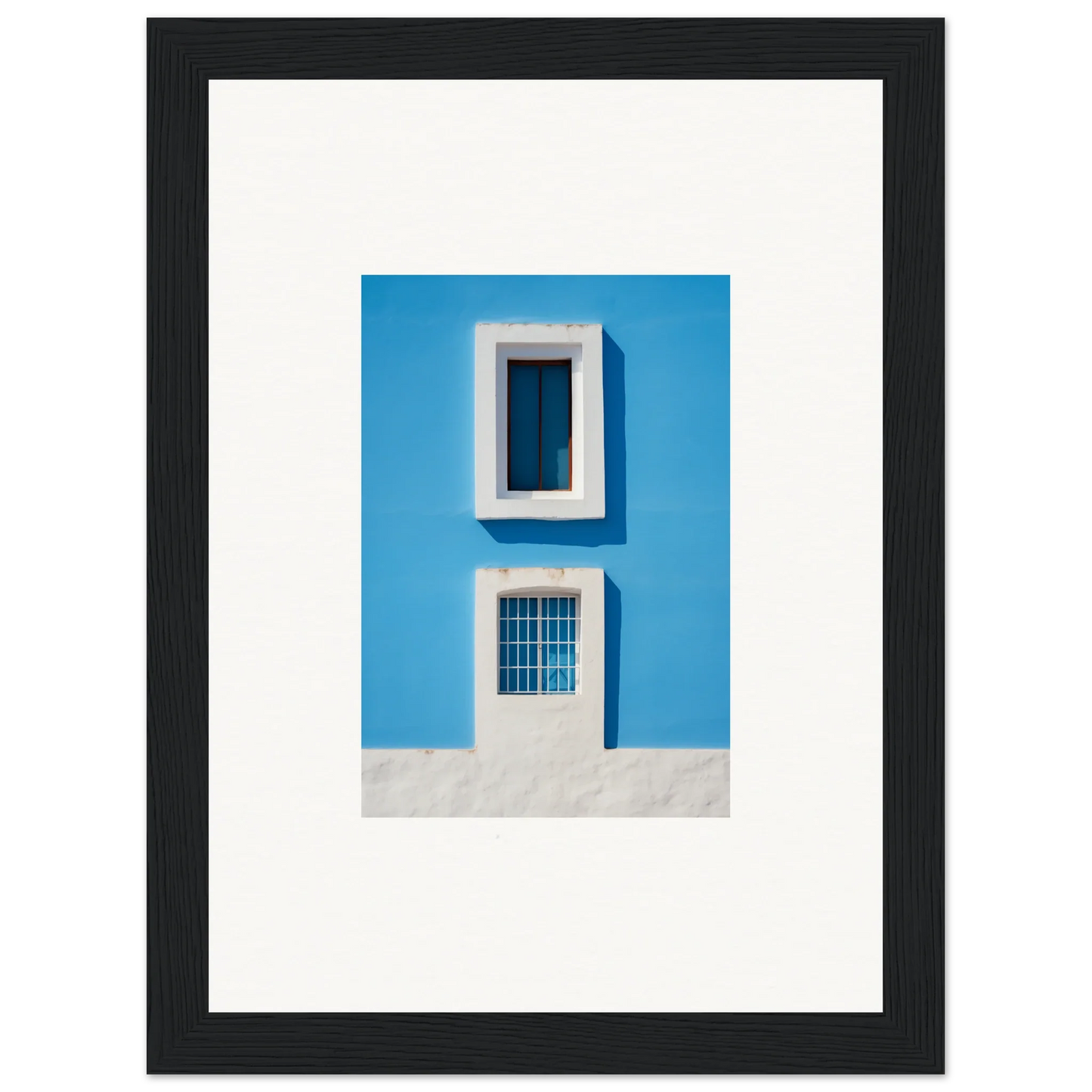 Framed wall art of a blue wall with a white-trimmed window from Isles Encompassed Vista