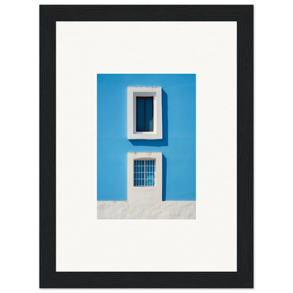 Framed wall art of a blue wall with a white-trimmed window from Isles Encompassed Vista