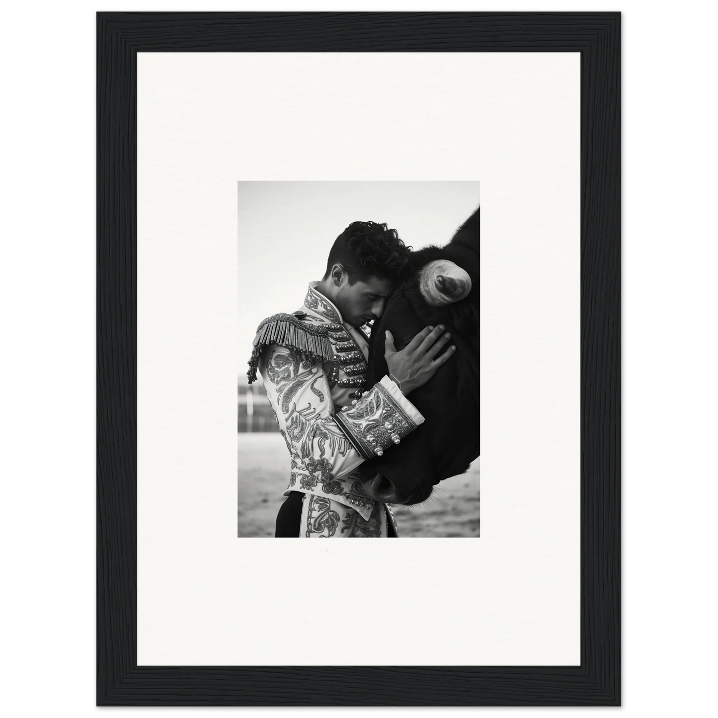 Black and white photo of a matador in an ornate jacket from Triumphant Shadows Embrace