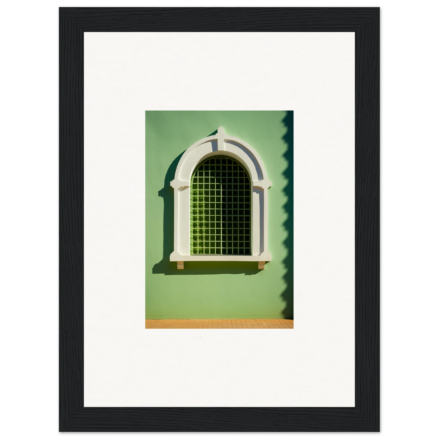 Arched Visible Equilibrium Window with decorative white trim and green metal grating