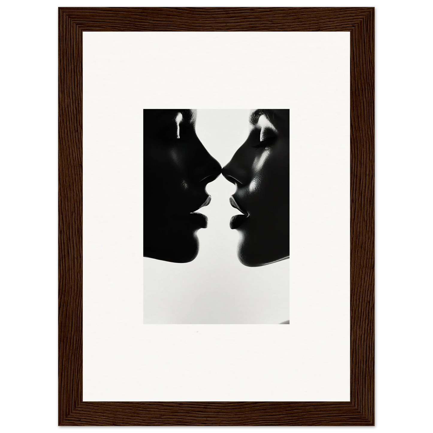 Two silhouetted profiles in a near-kiss pose for Eclipsing Soulcare Kisses art