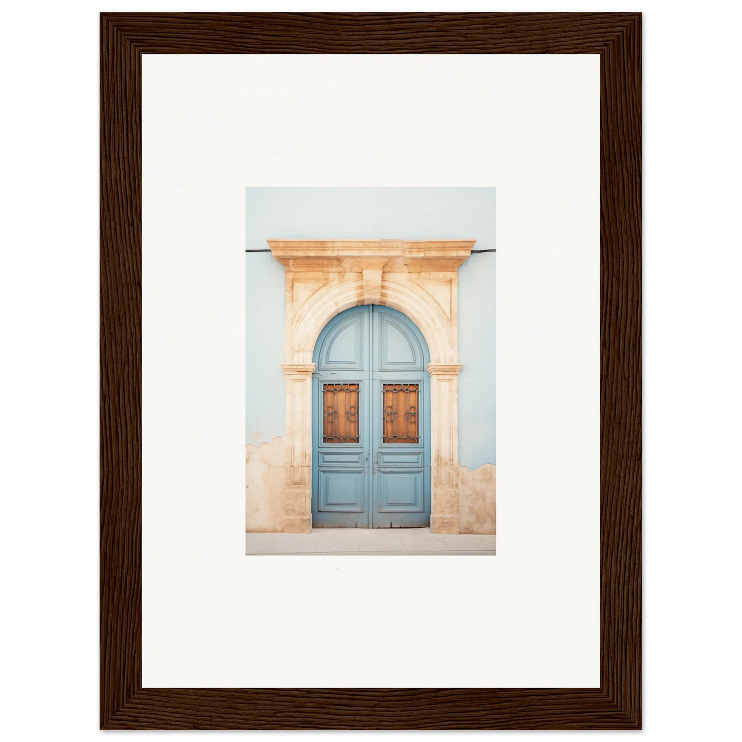 Light blue wooden door with ornate peach stone archway in special edition art™ design