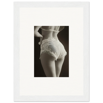 Framed black and white wall art of a woman’s hips in lace for chic room decoration