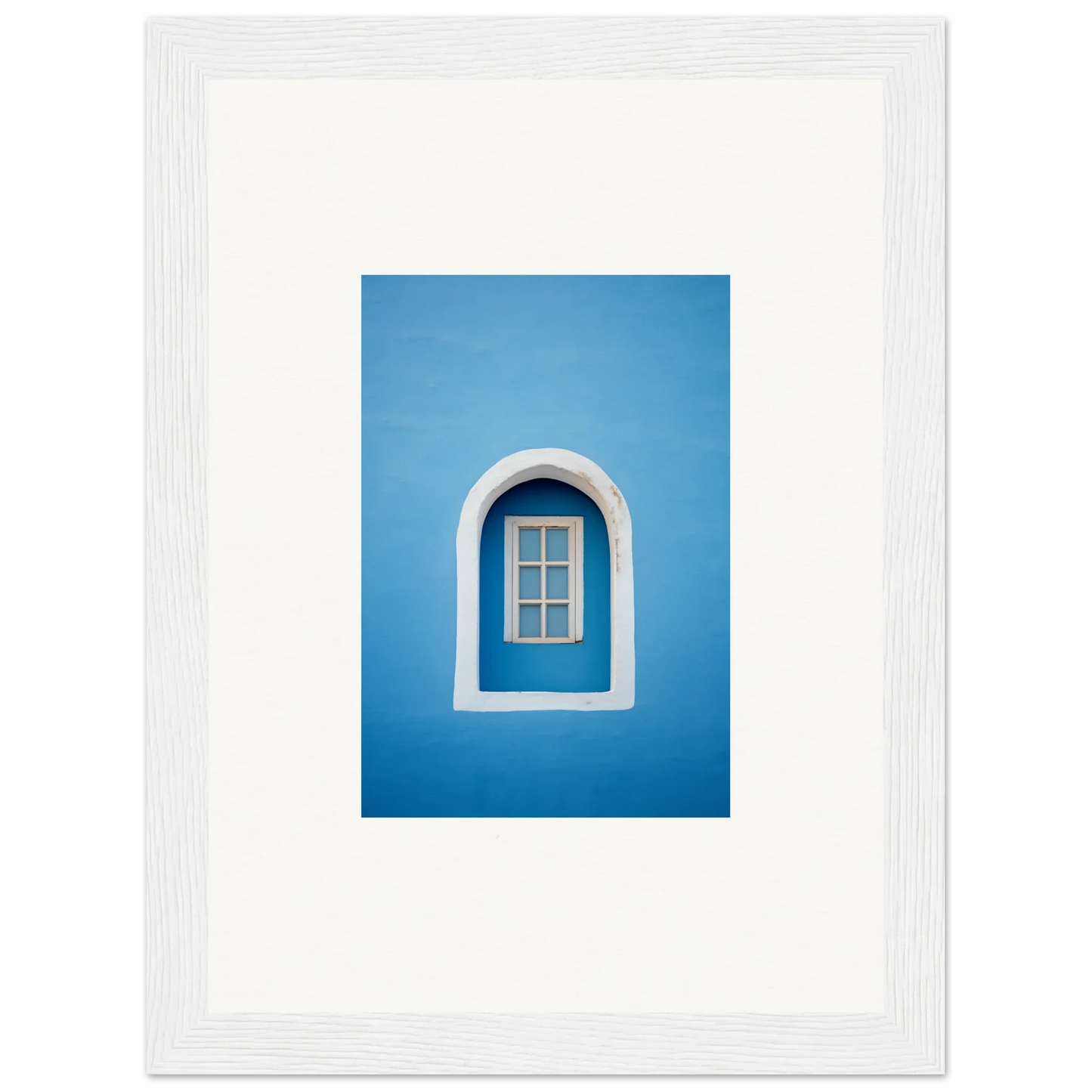 Arched white-framed window in a blue wall showcasing Whispers Sky Mosaic design