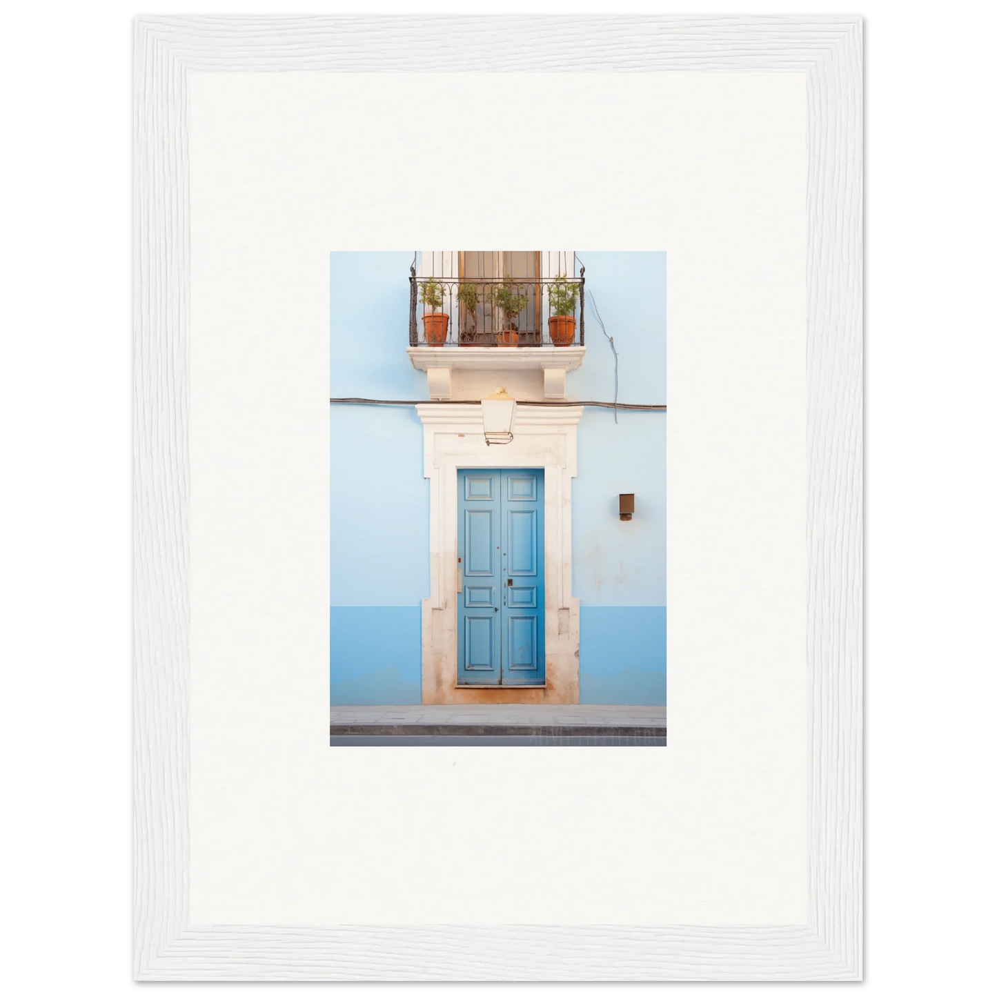 Blue wooden door with white stone frame and balcony in Ethereal Azul Entrance art