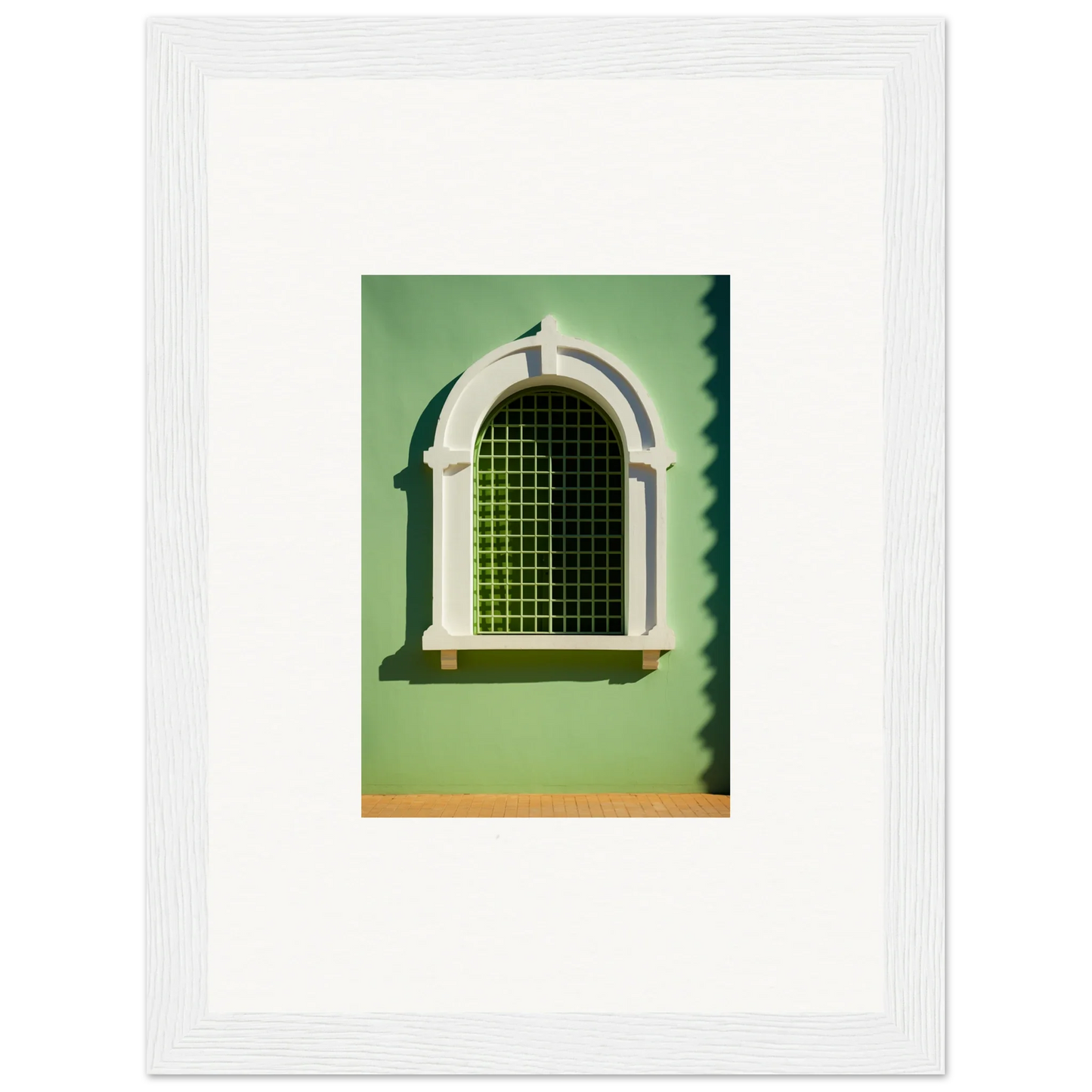 Arched Visible Equilibrium Window featuring decorative white trim and green grating