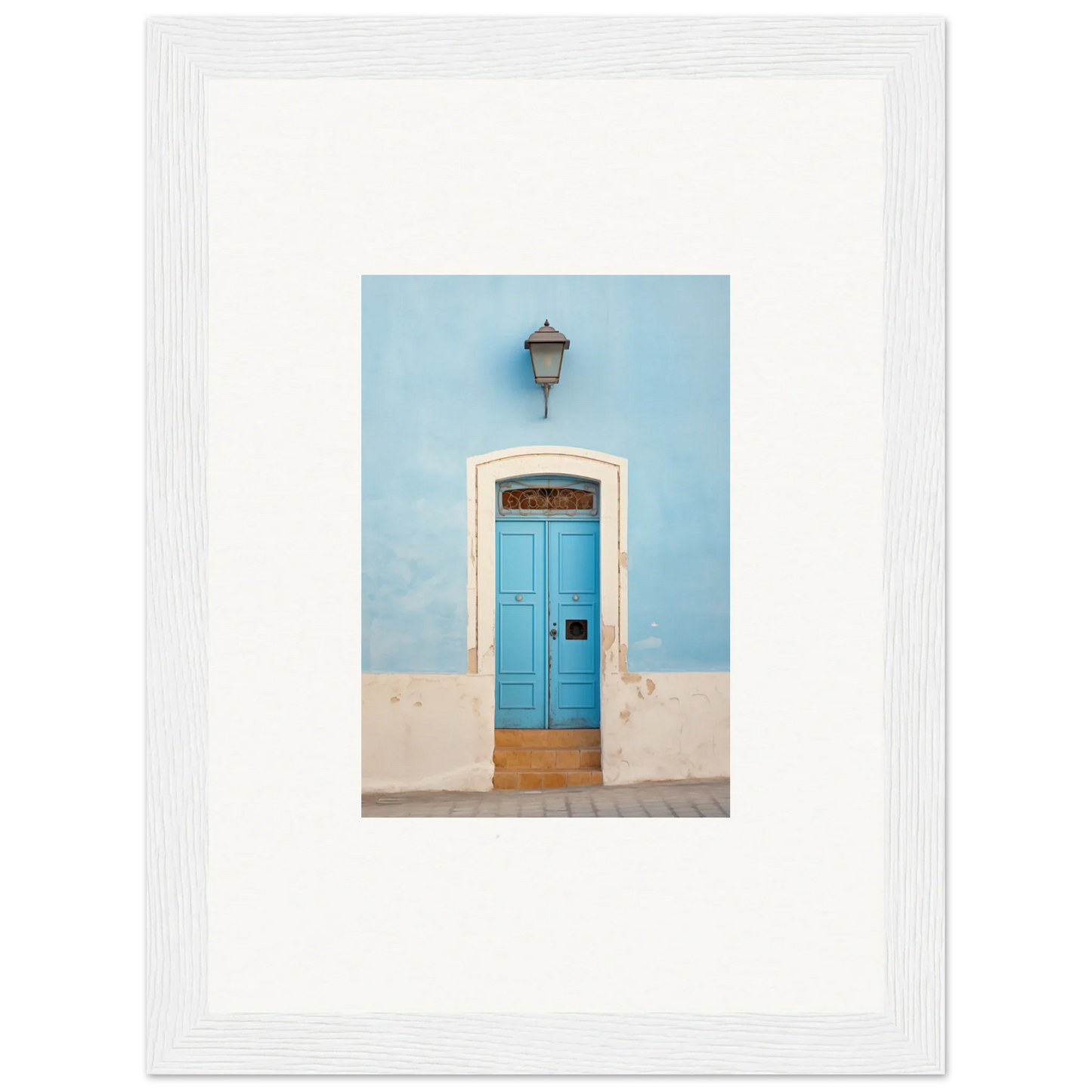 Bright blue wooden door with white stone trim in Surreal Azure Vesaurrezz art piece