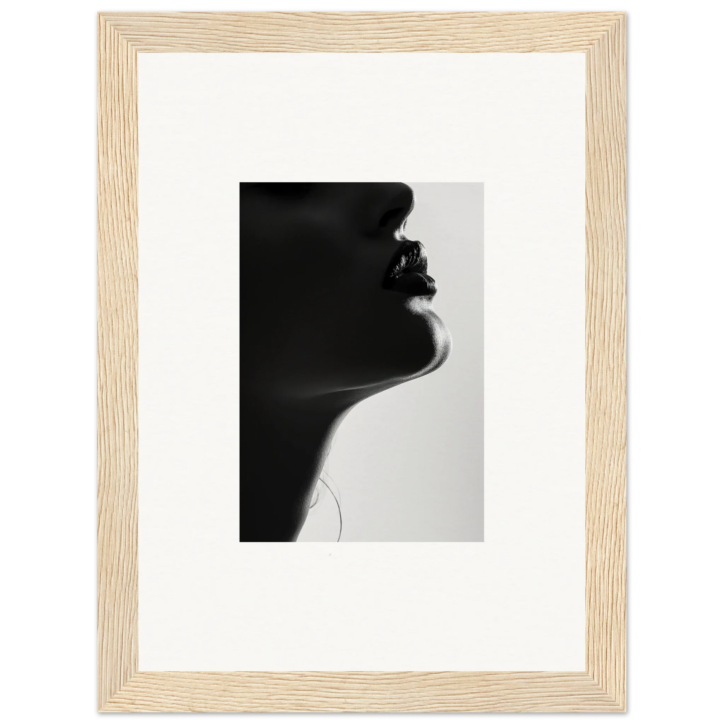 Black and white silhouette of graceful features in Shadowed Whisper Immanence framed wall art