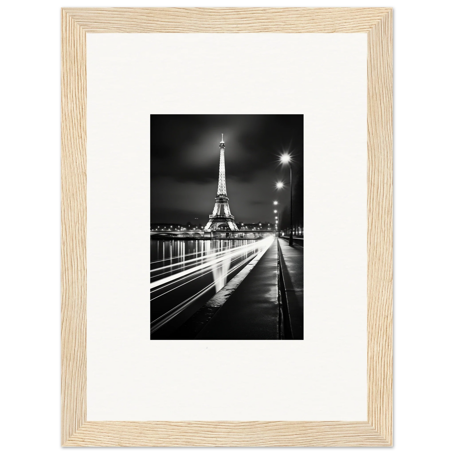 Black and white photo of the Eiffel Tower at night in a premium framed wall art