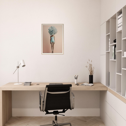 Minimalist home office workspace with a wooden desk, black office chair, and wall-mounted shelving unit.