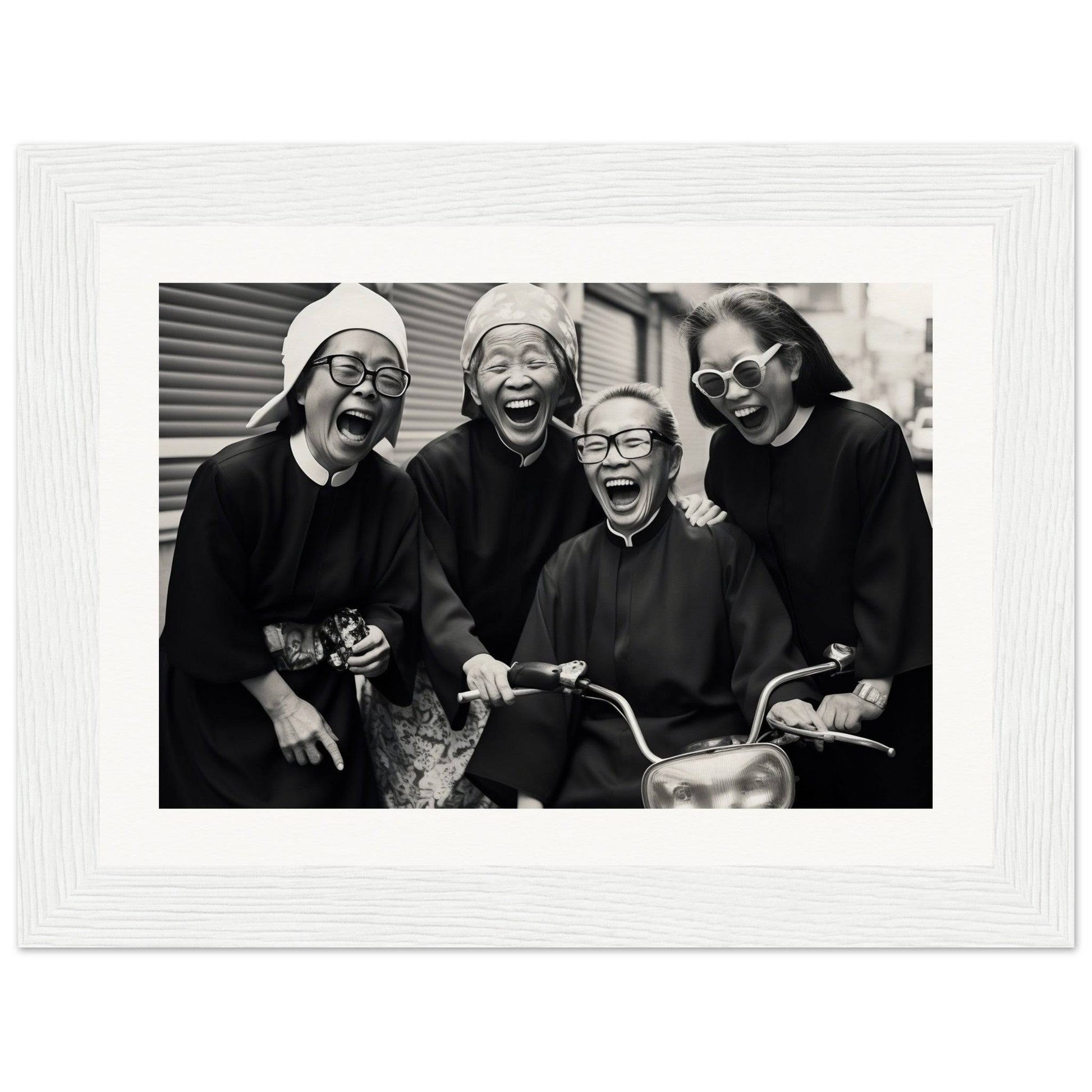 Black and white photograph of four smiling people in winter clothing.