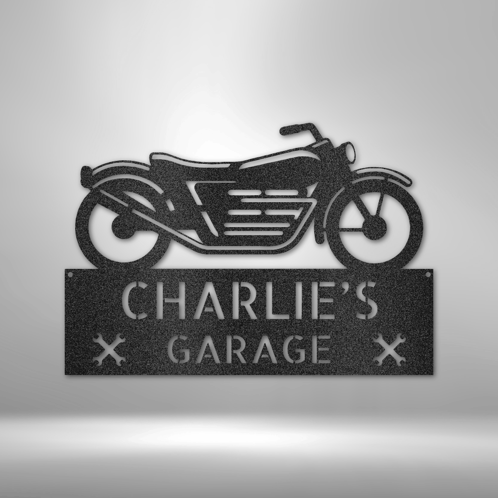 Metal sign featuring a motorcycle silhouette above text reading ’CHARLIE’S GARAGE’.