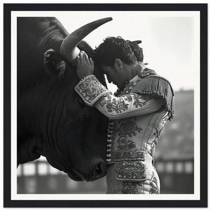 A matador in ornate attire faces a bull in Bull’s Forehead Commune framed wall art