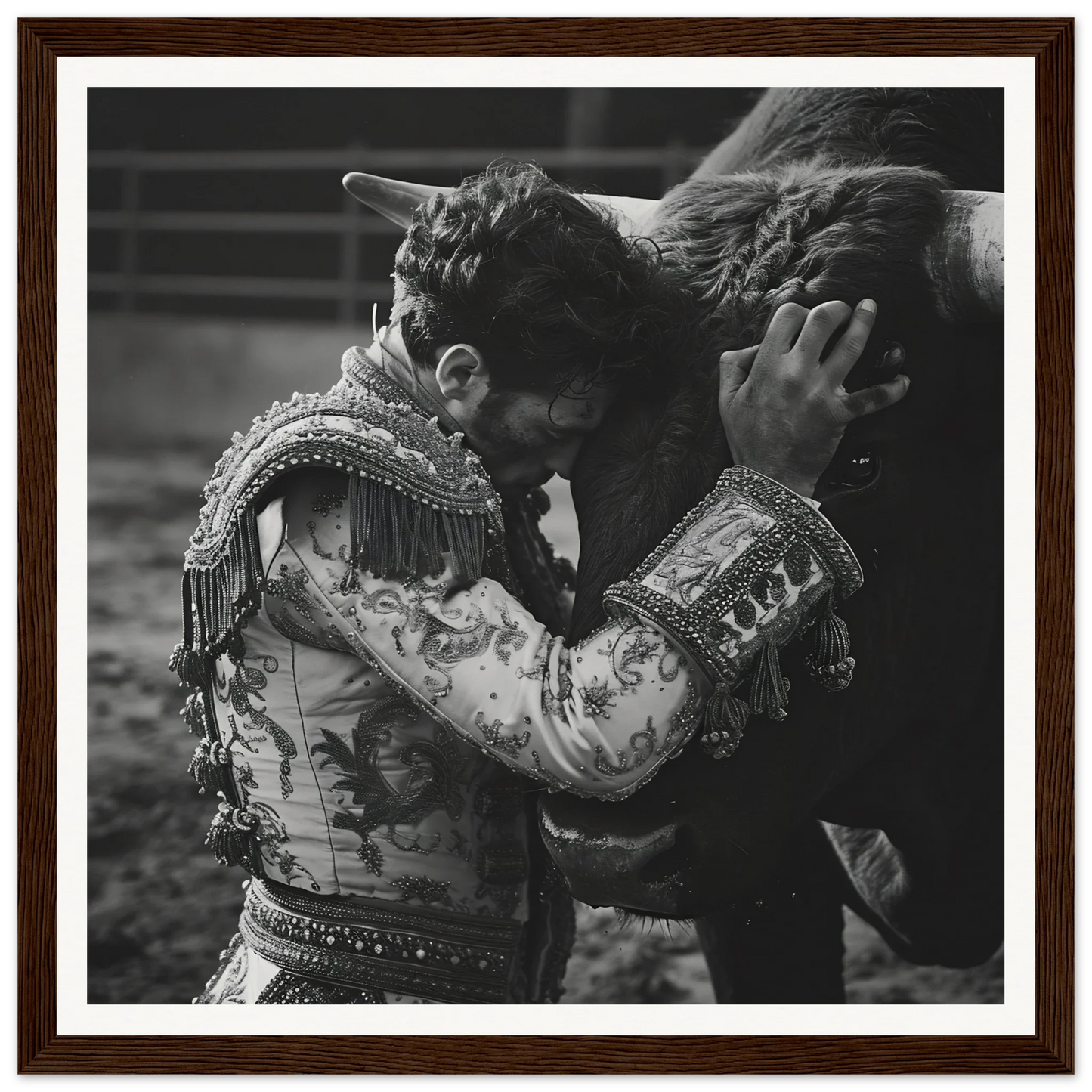 Matador in embroidered jacket embracing a bull in Graceful Reverie Duet framed poster